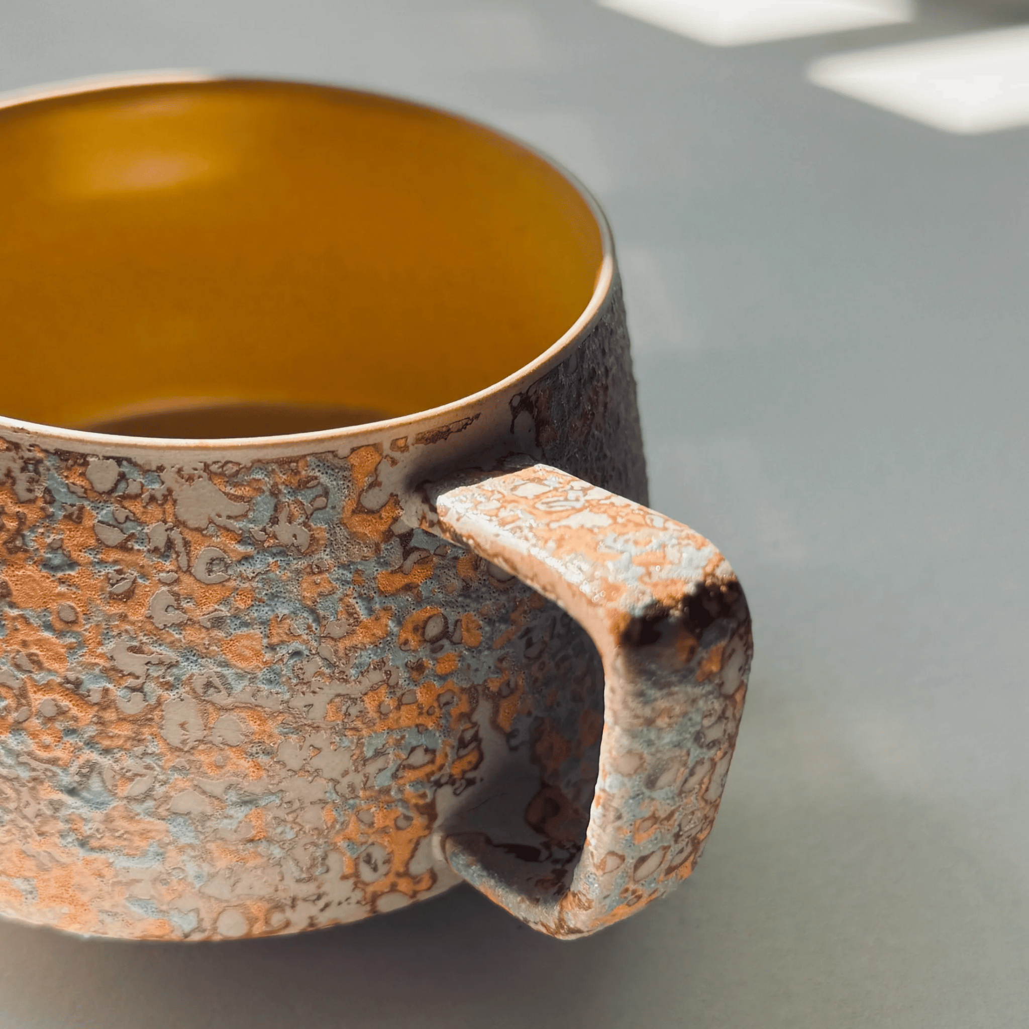 Ferrus Patina Coffee Mug – Handcrafted Ceramic Mug Gold Interior Wide Handle Rustic Kitchen Decor