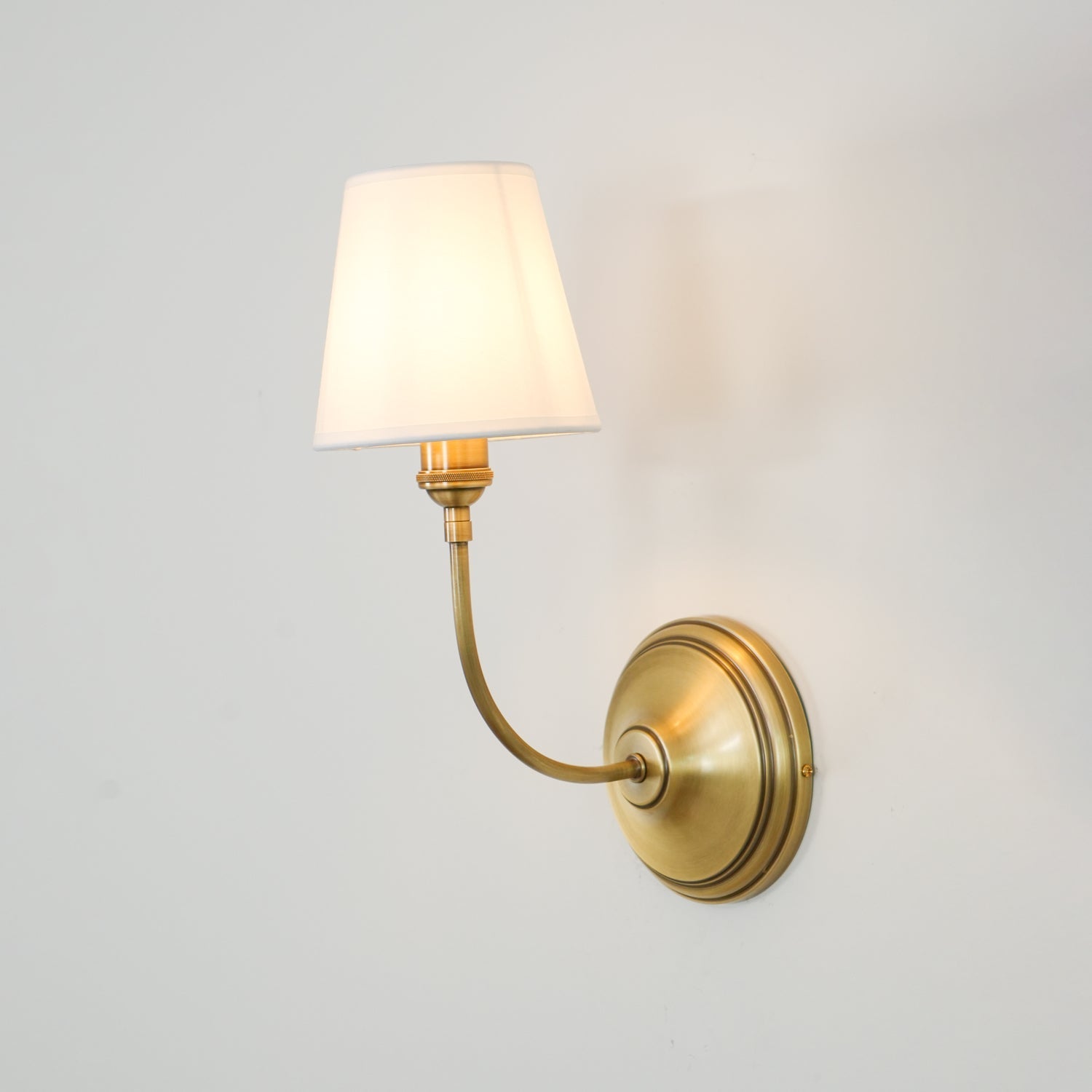 Gilded Ember Globe Wall Sconce – Brass Finish Ambient Glow Soft Shade LED Wall Light Premium Interiors